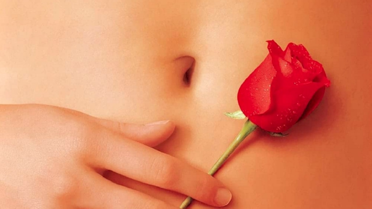 Poster 'American Beauty': Van wie zijn toch die hand en blote buik?