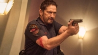 Actieheld Gerard Butler is een scherpschutter tijdens het WK Voetbal en waakt over 70.000 mensen