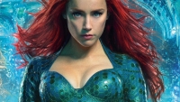 Amber Heard hint met foto naar terugkeer in 'Aquaman II'